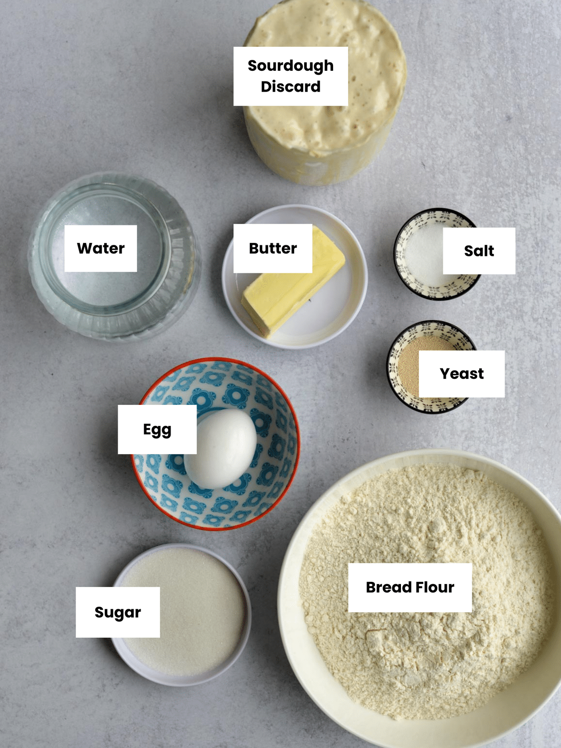 One hour sourdough discard roll ingredients on a countertop.